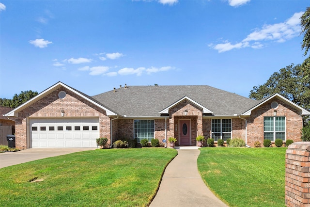 ranch-style home featuring a front yard and a garage