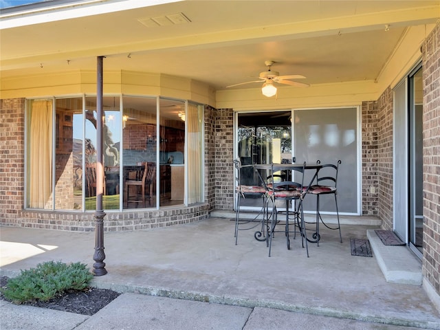 view of patio / terrace with ceiling fan