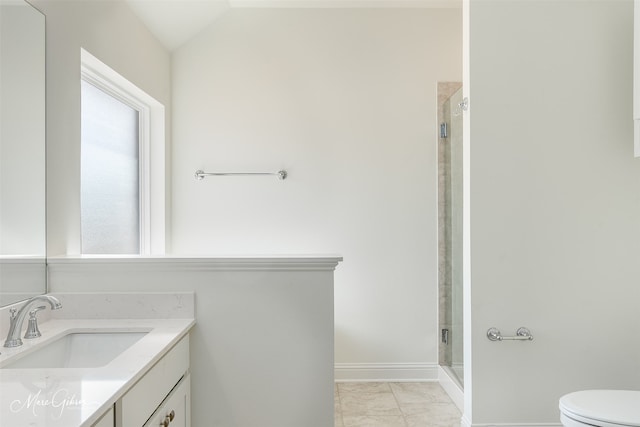 bathroom with vanity, toilet, lofted ceiling, and a shower with door