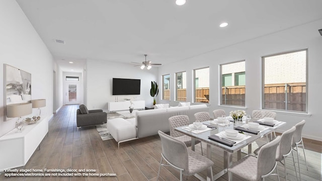 dining space with visible vents, wood finished floors, recessed lighting, baseboards, and ceiling fan