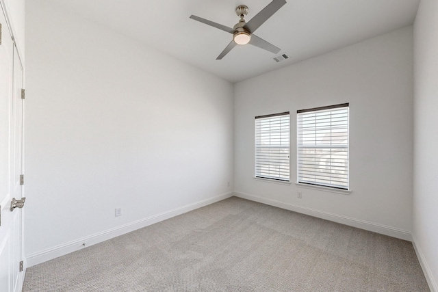 carpeted empty room with ceiling fan