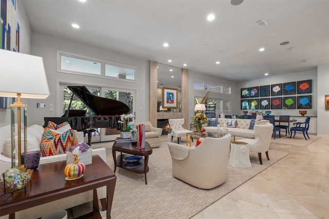 living room with a large fireplace