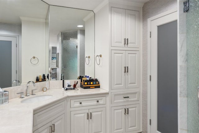 bathroom with vanity and crown molding