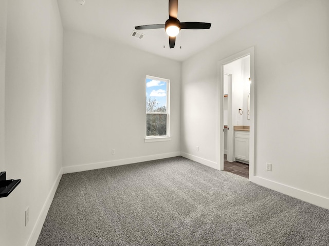 505 Aermotor Loop, Weatherford, TX 76085 - unfurnished bedroom featuring carpet floors, connected bathroom, and a ceiling fan