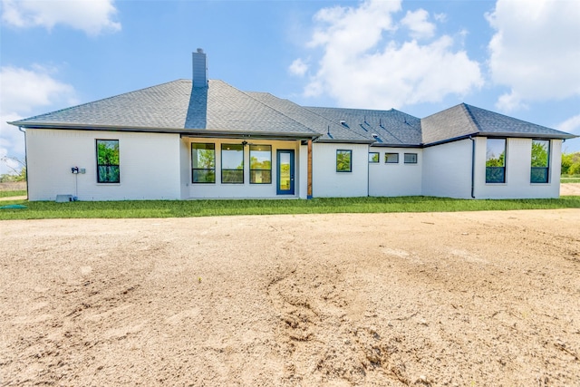 505 Aermotor Loop, Weatherford, TX 76085 - back of property featuring a chimney and brick siding