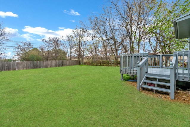 view of yard with a deck