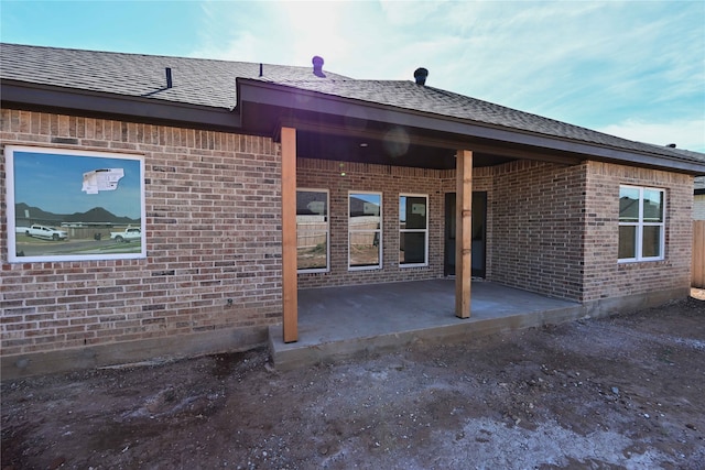 rear view of property with a patio area