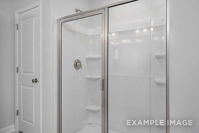 bathroom featuring walk in shower