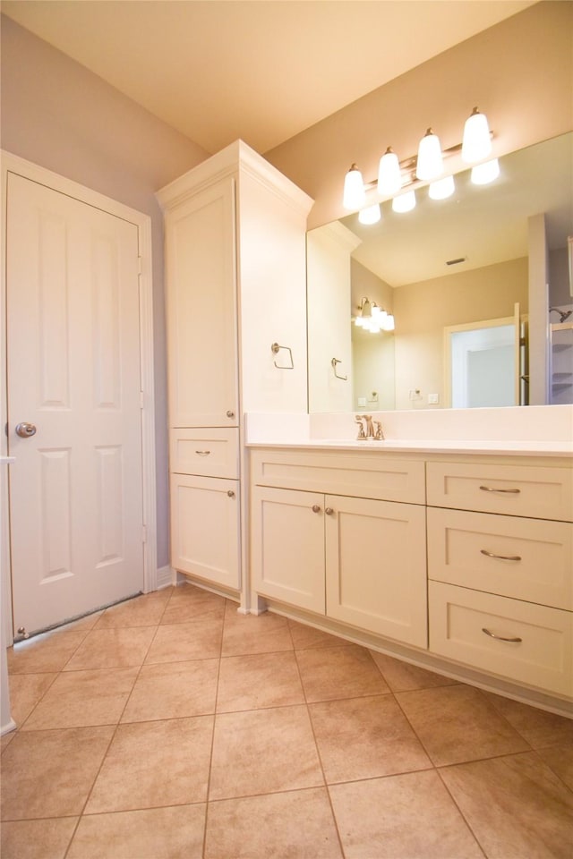 bathroom featuring vanity and tile patterned flooring