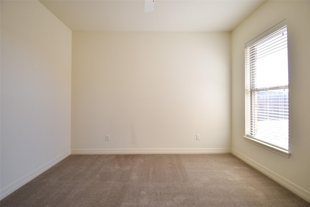 view of carpeted spare room