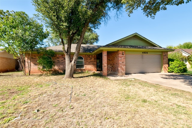 single story home with a garage