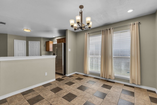 interior space featuring an inviting chandelier