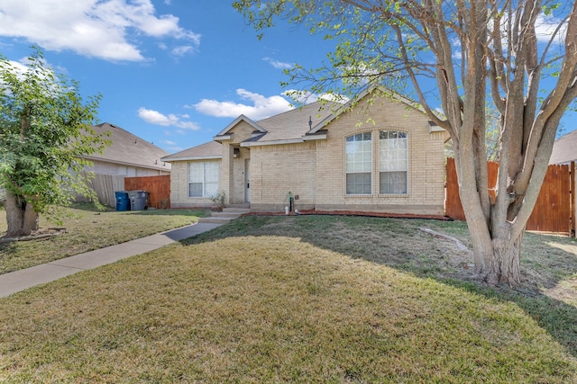 ranch-style house with a front yard