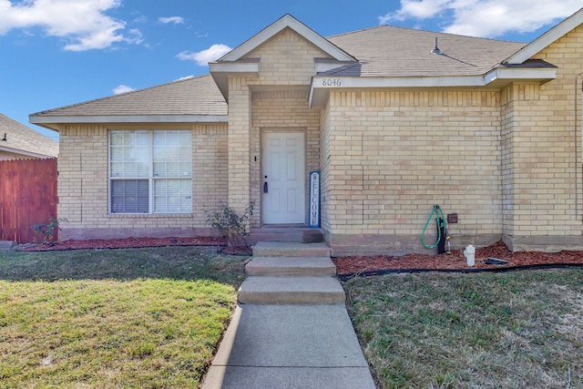 view of front of home with a front yard