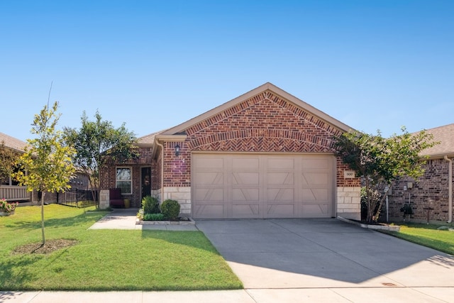 view of front of home with a garage and a front yard