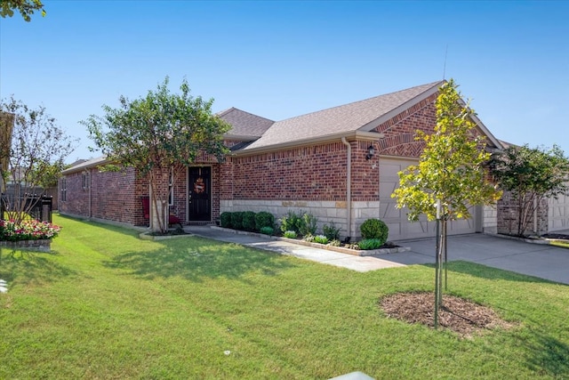 single story home featuring a garage and a front lawn