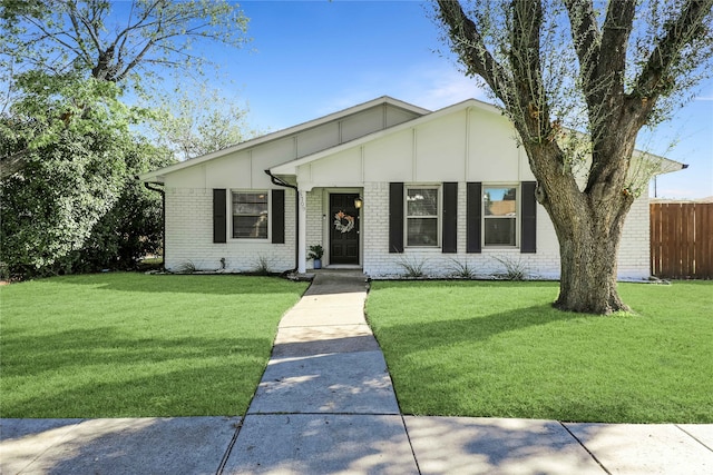 view of front facade with a front lawn