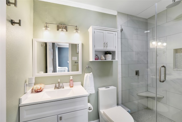 bathroom featuring vanity, toilet, and an enclosed shower