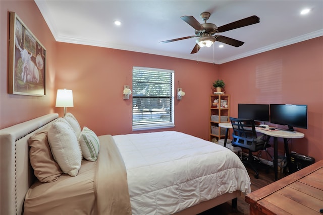 bedroom with ornamental molding, ceiling fan, and dark hardwood / wood-style floors