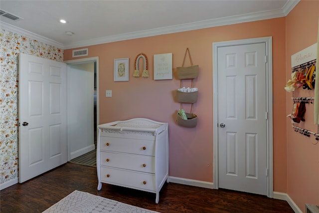 bedroom featuring dark hardwood / wood-style flooring and crown molding