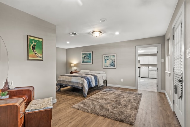 bedroom with light wood-type flooring