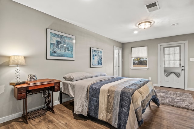 bedroom featuring hardwood / wood-style flooring