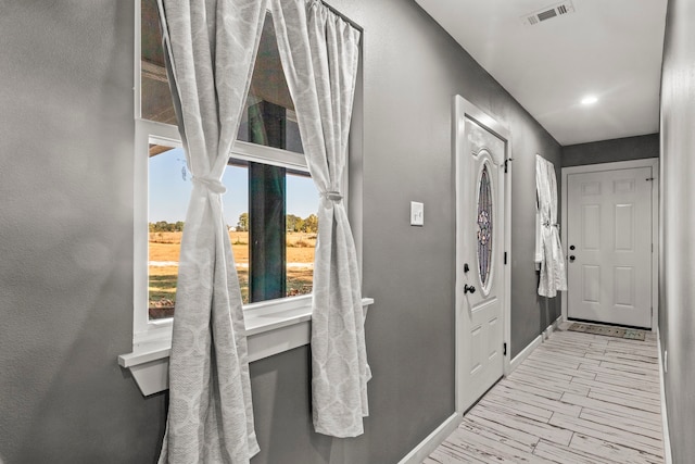 entrance foyer featuring light hardwood / wood-style floors