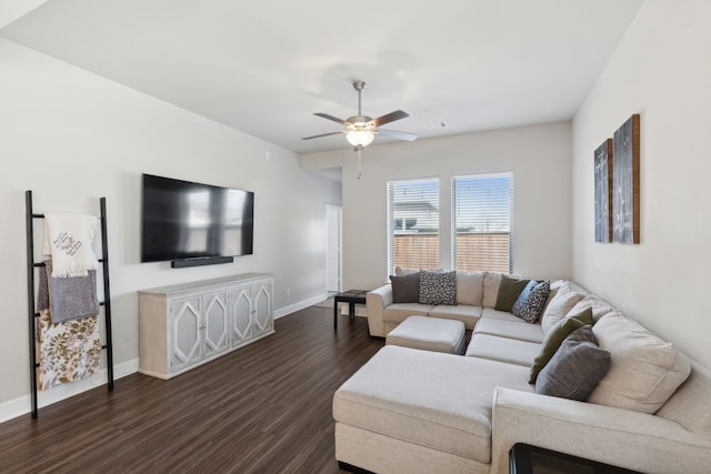 living room with dark hardwood / wood-style floors and ceiling fan