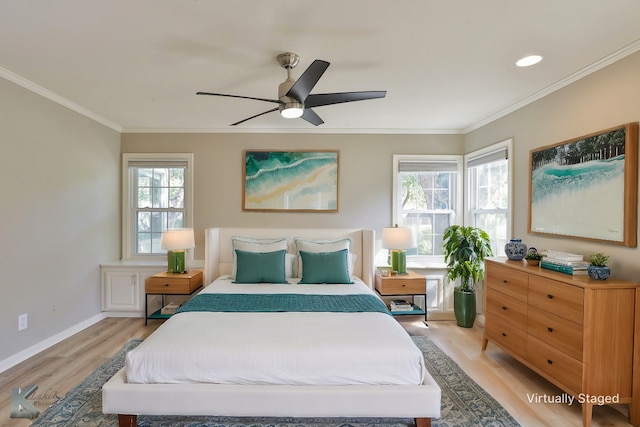 bedroom with multiple windows, light hardwood / wood-style floors, ceiling fan, and crown molding