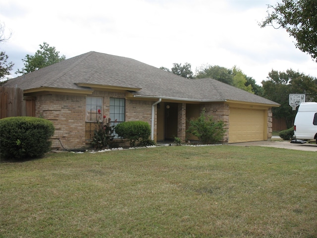 ranch-style house with a garage and a front yard