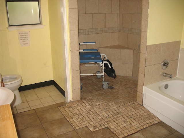 bathroom with tile patterned floors and toilet