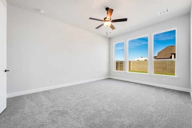 carpeted living room with lofted ceiling