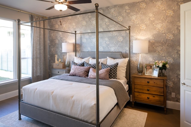 bedroom with hardwood / wood-style floors and ceiling fan