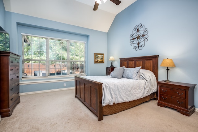 carpeted bedroom with lofted ceiling and ceiling fan