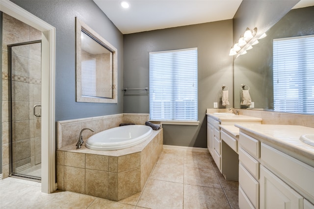 bathroom featuring vanity, shower with separate bathtub, tile patterned flooring, and plenty of natural light