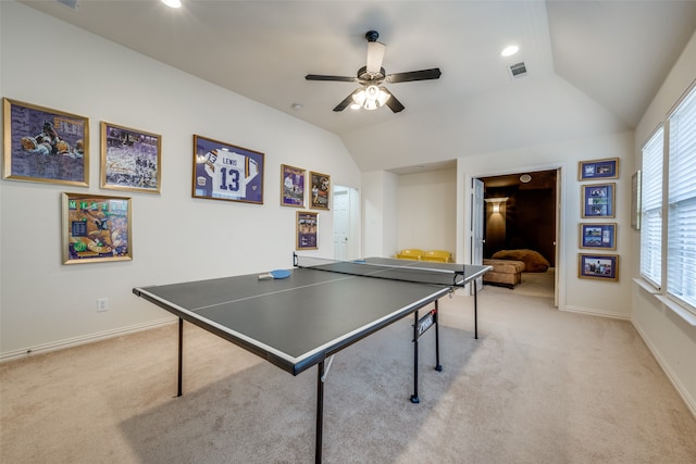 playroom with vaulted ceiling, light colored carpet, and ceiling fan