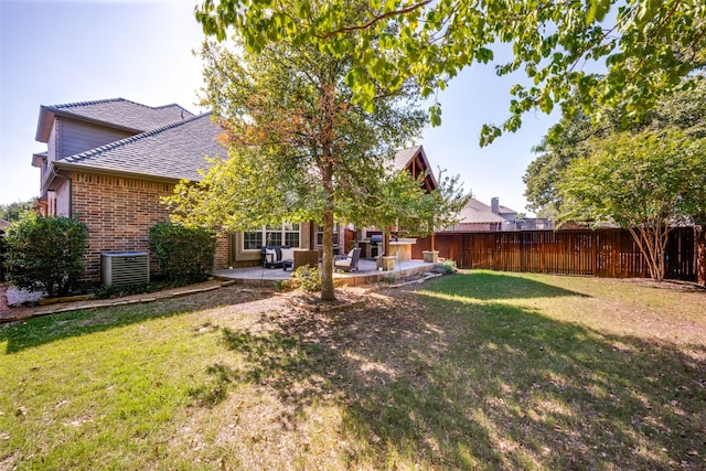 view of yard featuring a patio and cooling unit