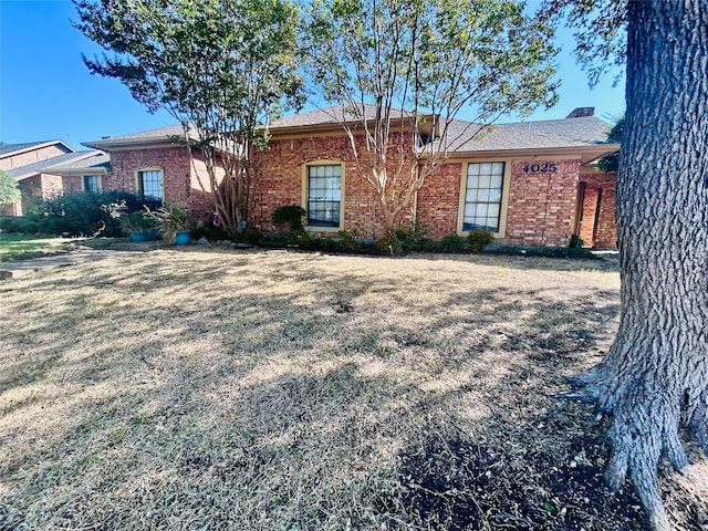 exterior space with a front yard