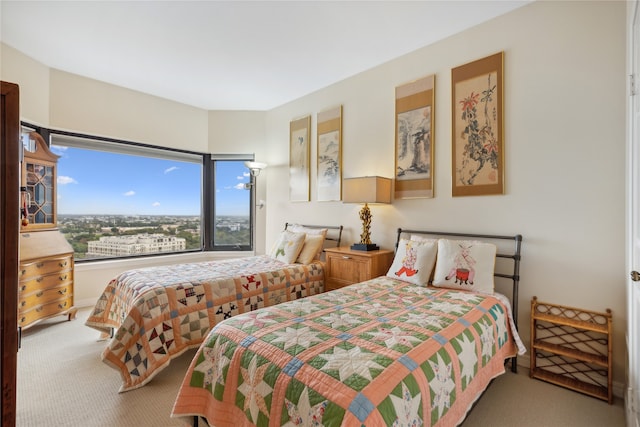 bedroom with light colored carpet