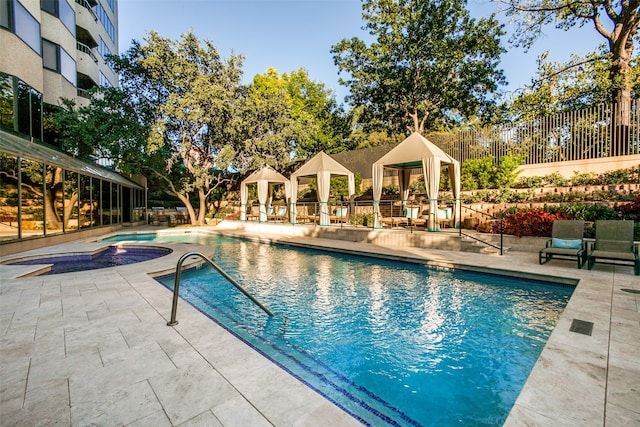 view of pool featuring a gazebo and a patio area