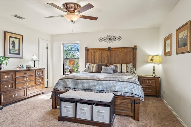 bedroom with baseboards, visible vents, ceiling fan, and carpet flooring