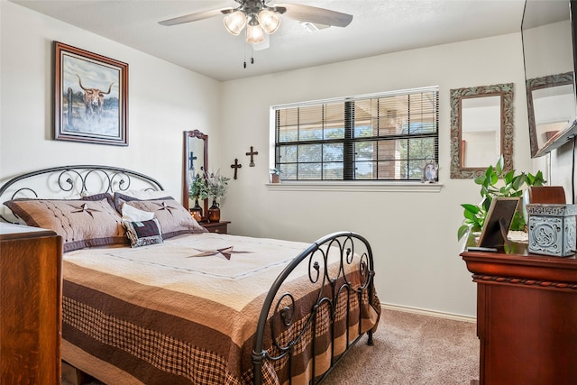 bedroom featuring carpet, ceiling fan, and baseboards