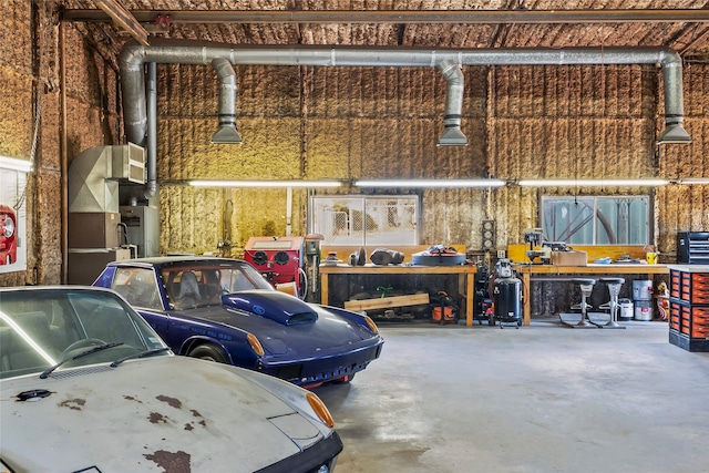 garage with a workshop area