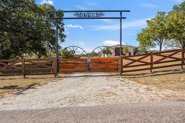 view of gate featuring fence