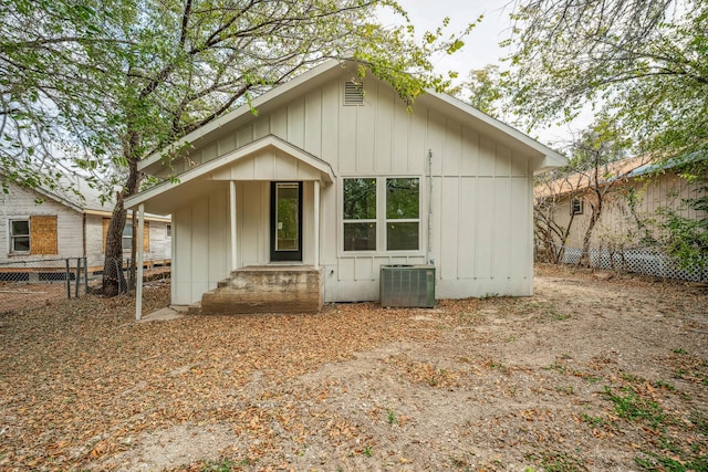 rear view of property with central air condition unit