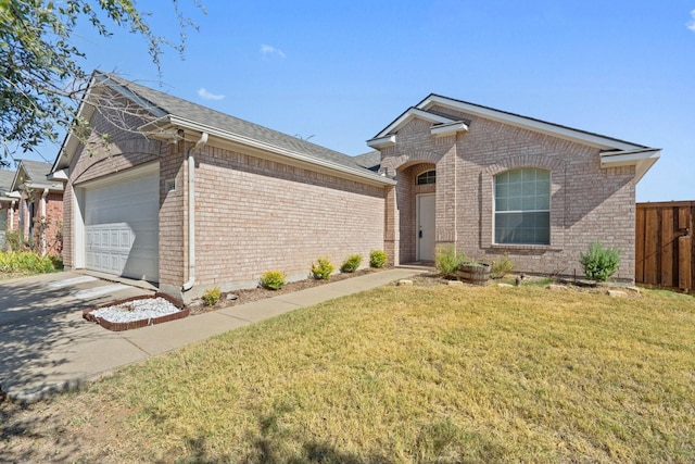 ranch-style house featuring a garage, brick siding, fence, driveway, and a front lawn