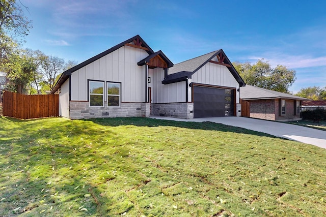 modern inspired farmhouse featuring a garage and a front yard