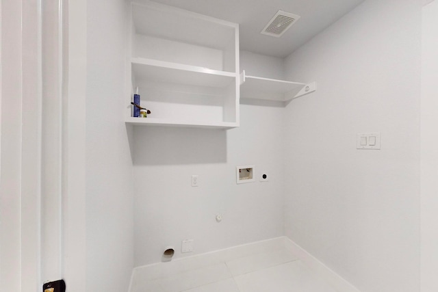 laundry room featuring washer hookup, hookup for a gas dryer, electric dryer hookup, and light tile patterned flooring