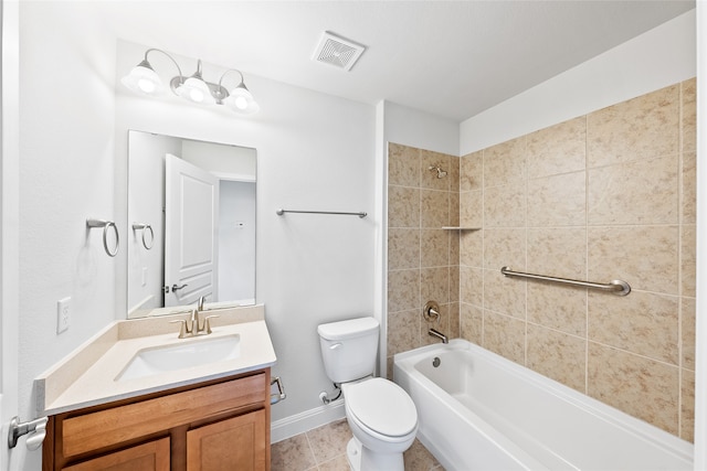 full bathroom featuring tile patterned flooring, vanity, toilet, and tiled shower / bath