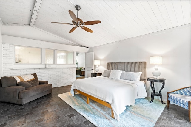 bedroom featuring ceiling fan, brick wall, wooden ceiling, and vaulted ceiling with beams